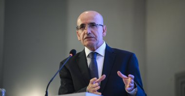 Treasury and Finance Minister Mehmet Şimşek delivers a speech during an event, Istanbul, Türkiye, May 29, 2024. (AA Photo)
