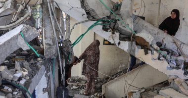 Palestinians inspect the damage in a house after an overnight Israeli strike on al-Daraj neighborhood in Gaza City, Palestine, June 11, 2024. (AFP Photo)