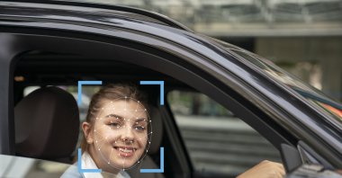 A woman is scanned by face recognition technology. (Getty Images Photo)
