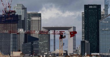 This photograph shows the Grande Arche de La Defense (C) in the La Defense business district on the western outskirts of Paris, France, March 29, 2024. (AFP Photo)