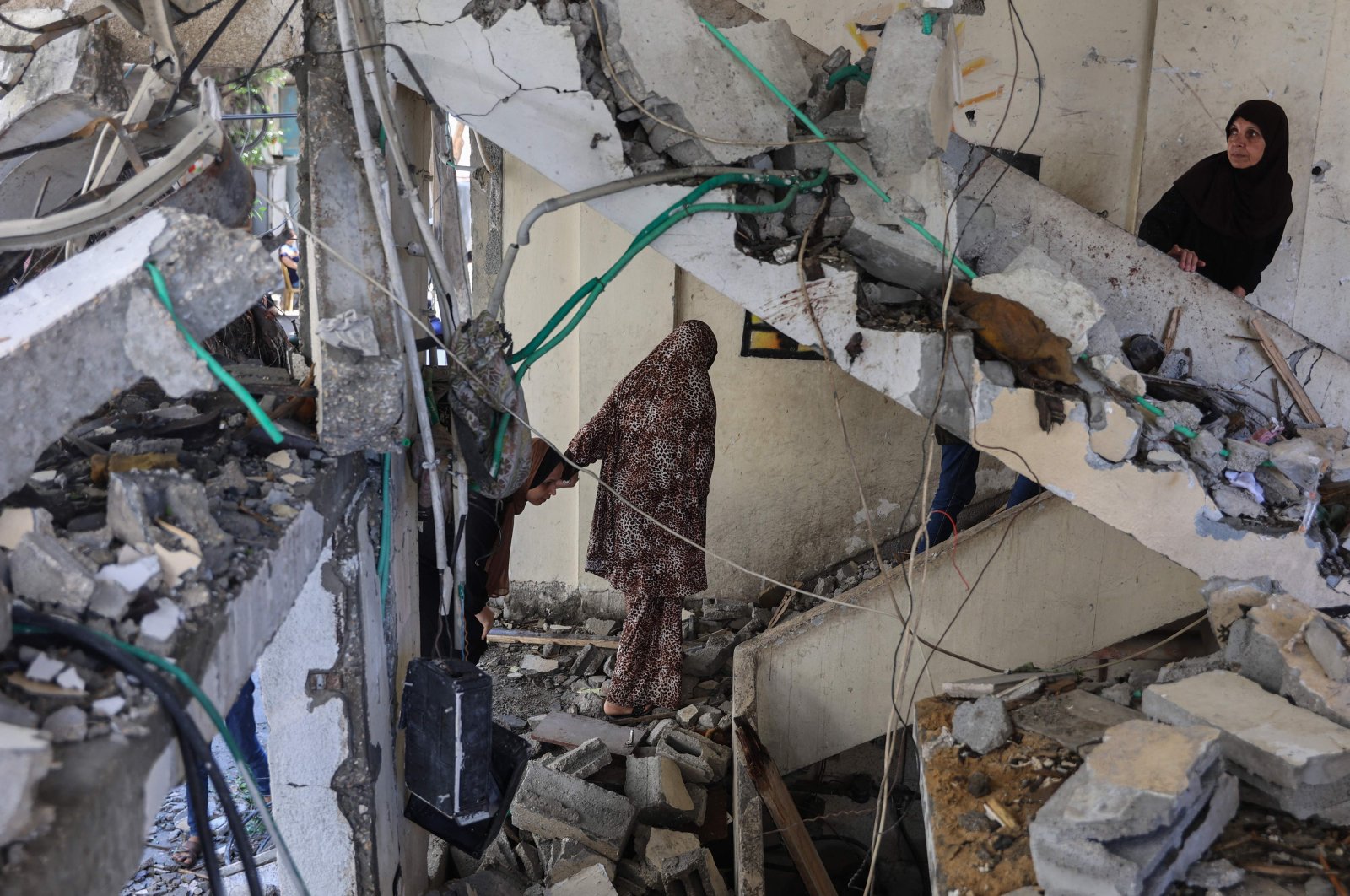 Palestinians inspect the damage in a house after an overnight Israeli strike on al-Daraj neighborhood in Gaza City, Palestine, June 11, 2024. (AFP Photo)