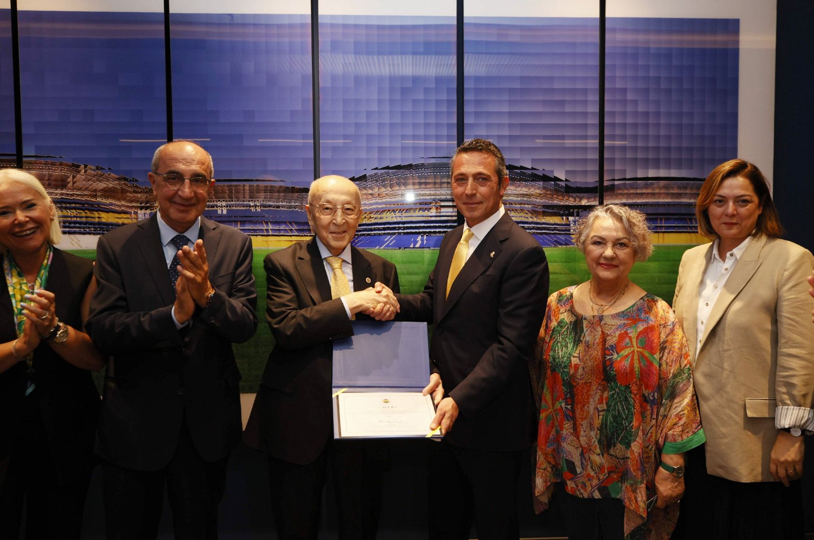 Fenerbahçe President Ali Koç (3rd R) celebrates after being reelected at the Electoral Ordinary General Assembly, Istanbul, Türkiye, June 11, 2024. (AA Photo)