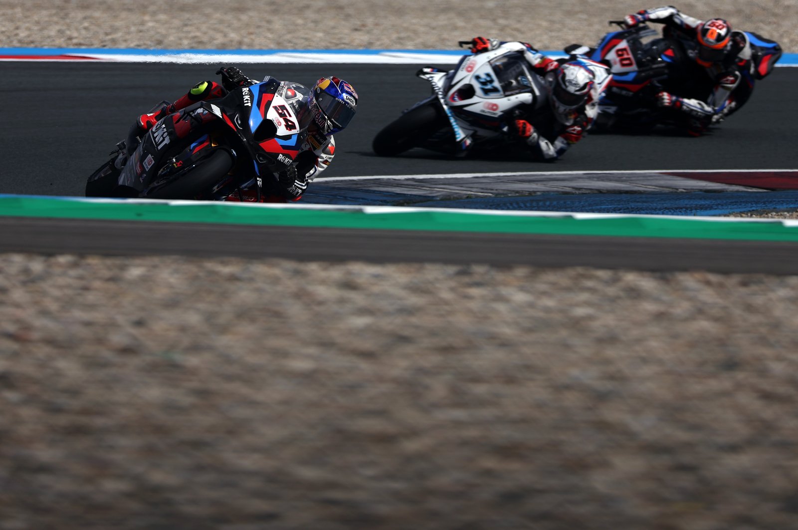 Türkiye&#039;s Toprak Razgatlıoğlu (L) riding a BMW M1000RR for team Germany ROKiT BMW Motorrad WorldSBK Team competes in the WorldSBK or Superbike World Championship, second practice session held at TT Circuit Assen, Assen, Netherlands, April 19, 2024. (Getty Images Photo)