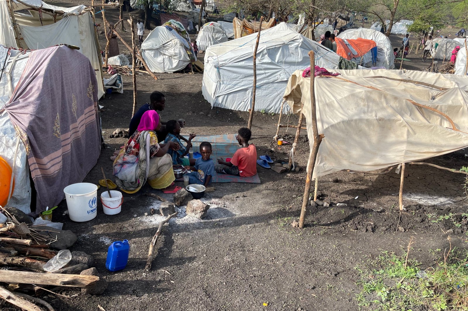 Sudanese refugees sit by makeshift shelters near Awlala Camp, Amhara region, Ethiopia, May 31, 2024. (Reuters Photo)