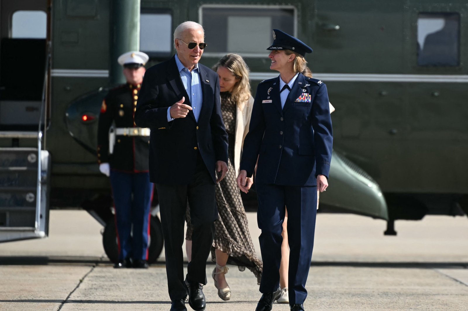 U.S. President Joe Biden is welcomed by Air Force Colonel Angela Ochoa as he arrives to board Air Force One at Joint Base Andrews in Maryland, June 12, 2024. (AFP Photo)