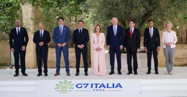 From left, European Council President Charles Michel, German Chancellor Olaf Scholz, Canadian Prime Minister Justin Trudeau, French President Emmanuel Macron, Italy&#039;s Prime Minister Giorgia Meloni, U.S. President Joe Biden, Japanese Prime Minister Fumio Kishida, British Prime Minister Rishi Sunak and President of the European Commission Ursula von der Leyen pose for a family photo during the G-7 Summit in Apulia region, Italy, June 13, 2024. (AFP Photo)