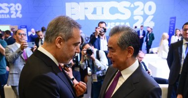 Foreign Minister Hakan Fidan meets with Chinese Foreign Minister Wang Yi (R) during the BRICS  session as part of the BRICS Foreign Ministers Meeting, Nizhny Novgorod, Russia, June 11, 2024. (AA Photo)