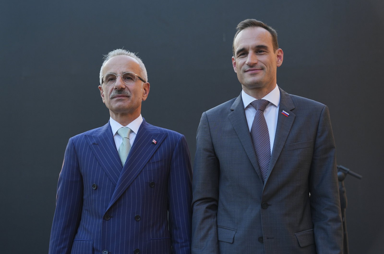 Transport and Infrastructure Minister Abdulkadir Uraloğlu (L) and Slovenia&#039;s Ambassador to Ankara, Gorazd Rencelj, pose for a photo during an event in Ankara, Türkiye, June 6, 2024. (AA Photo)