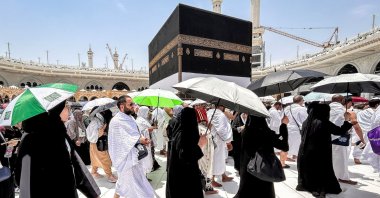 Muslim worshippers walk around the Kaaba, Islam's holiest site, at the Grand Mosque ahead of the annual Hajj pilgrimage, Mecca, Saudi Arabia, June 13, 2024. (AFP Photo)