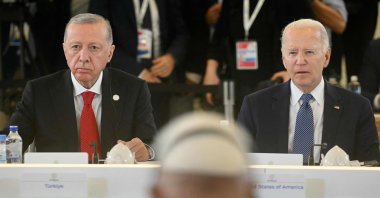 President Recep Tayyip Erdoğan (L) and U.S. President Joe Biden sit in front of Pope Francis during a working session on artificial intelligence (AI), energy and the Africa-Mediterranean region at the Borgo Egnazia resort, Savelletri, Italy, June 14, 2024. (AFP Photo)