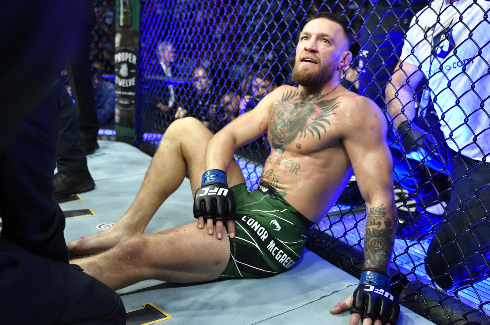 Conor McGregor reacts after his TKO loss due to injury against Dustin Poirier during the UFC 264 event at T-Mobile Arena, Las Vegas, Nevada, U.S., July 10, 2021. (Getty Images Photo)