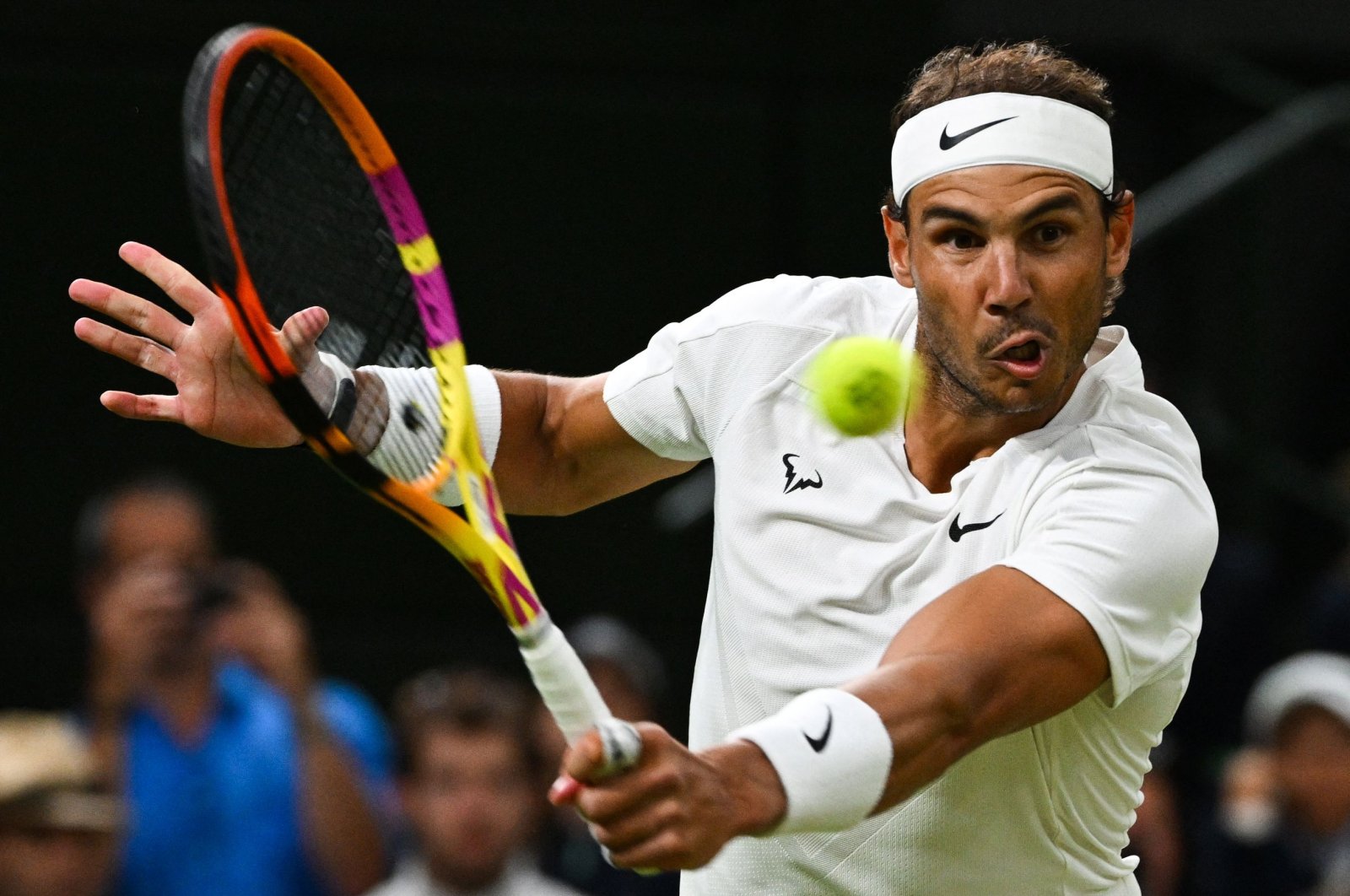 Spain&#039;s Rafael Nadal returns the ball to Italy&#039;s Lorenzo Sonego during their men&#039;s singles tennis match on the sixth day of the 2022 Wimbledon Championships at The All England Tennis Club in Wimbledon, London, U.K., July 2, 2022.  (AFP Photo)