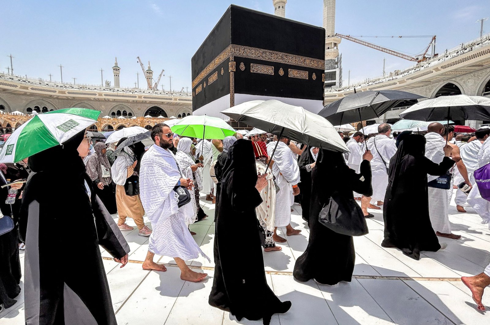Muslim worshippers walk around the Kaaba, Islam&#039;s holiest site, at the Grand Mosque ahead of the annual Hajj pilgrimage, Mecca, Saudi Arabia, June 13, 2024. (AFP Photo)