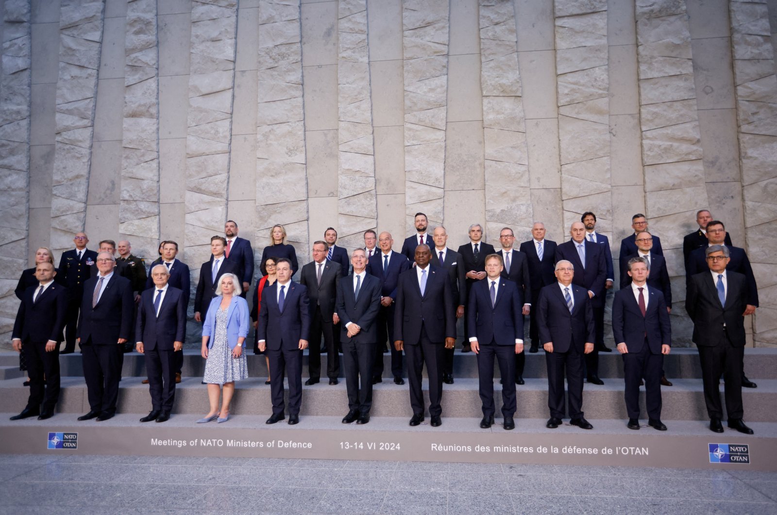 Defense Minister Yaşar Güler (3rd R) poses alongside counterparts for a family photo at the NATO defense ministers&#039; meeting at the Alliance&#039;s headquarters, Brussels, Belgium June 14, 2024. (Reuters Photo)