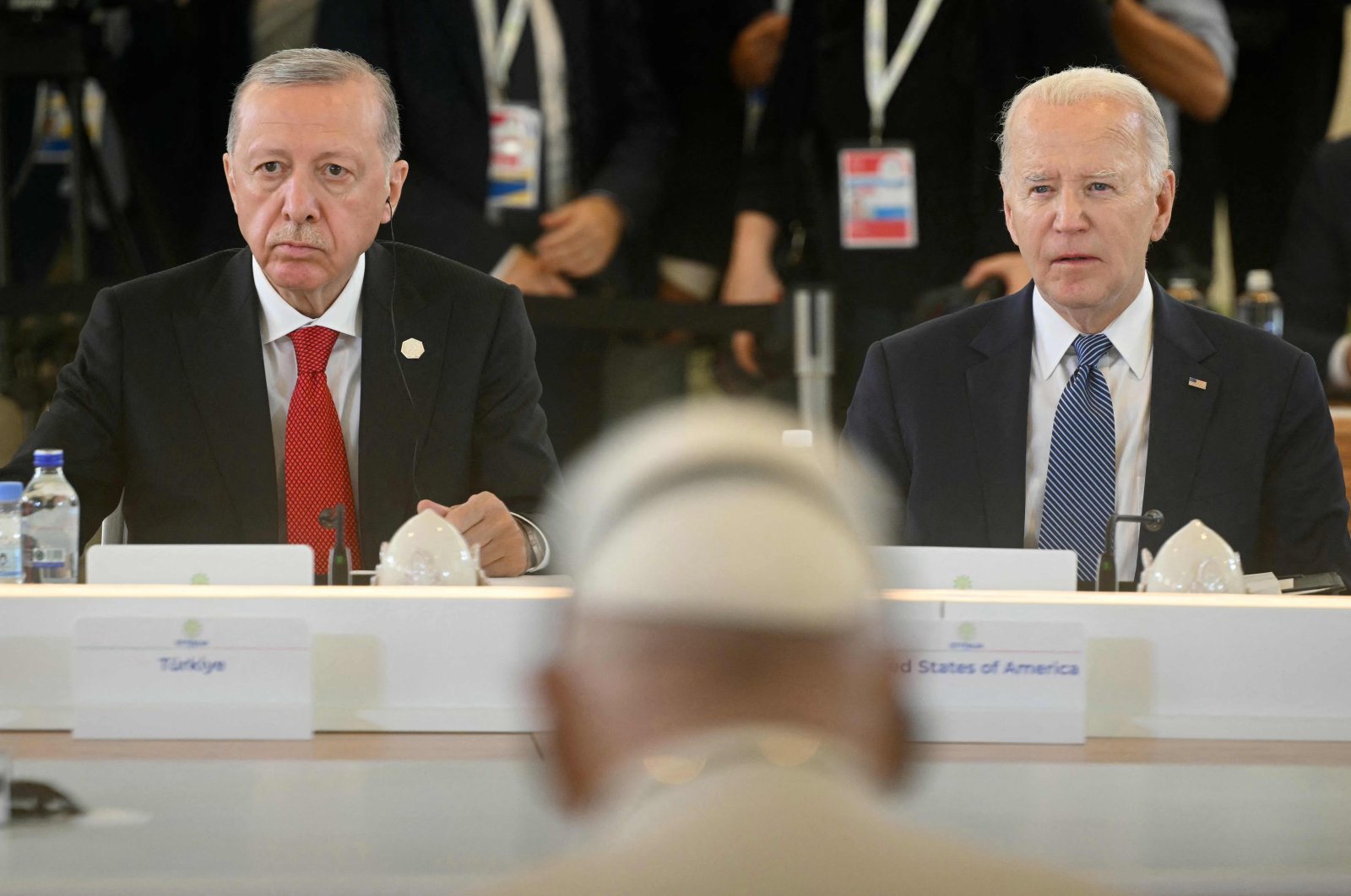 President Recep Tayyip Erdoğan (L) and U.S. President Joe Biden sit in front of Pope Francis during a working session on artificial intelligence (AI), energy and the Africa-Mediterranean region at the Borgo Egnazia resort, Savelletri, Italy, June 14, 2024. (AFP Photo)