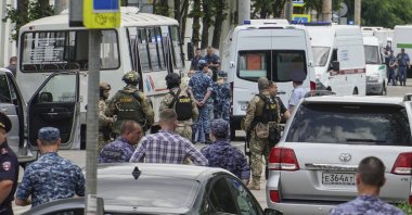 Russian police officers stand guard near a pretrial detention center where criminals took FSIN employees hostage, Rostov-on-Don, Russia, June 16, 2024. (EPA Photo)