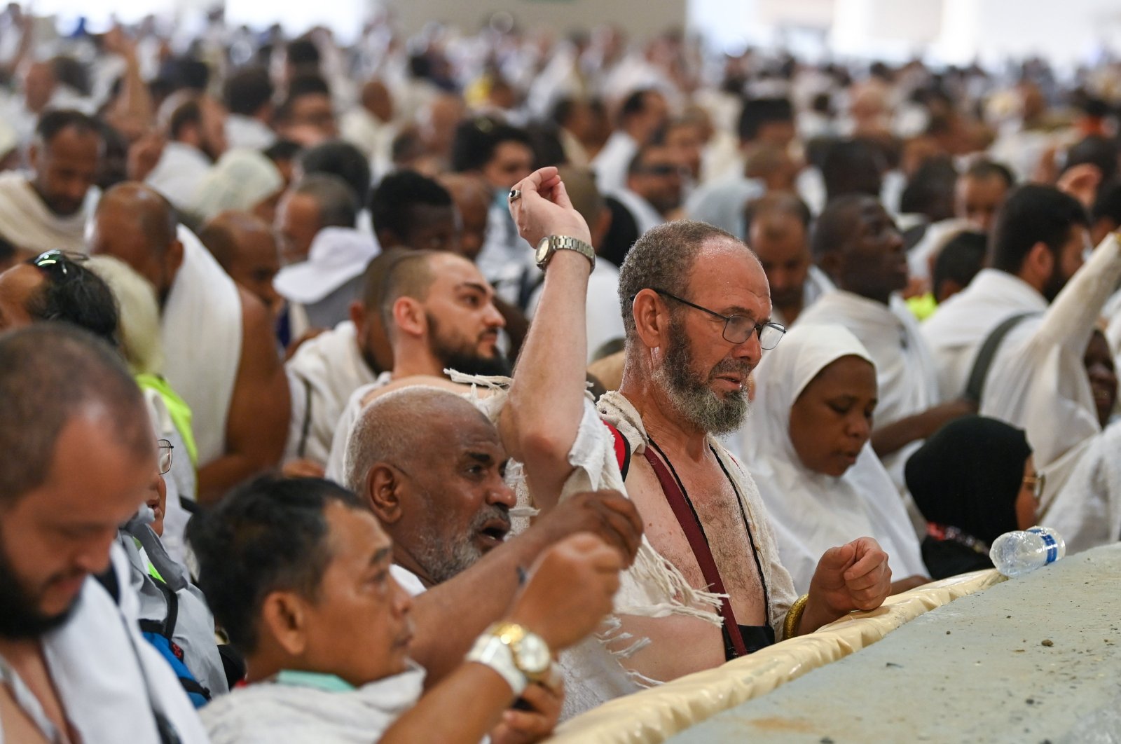 Muslim pilgrims attend the symbolic stoning of the devil ritual at the Jamarat Bridge during the Hajj pilgrimage, Mecca, Saudi Arabia, June 16, 2024. (EPA Photo)