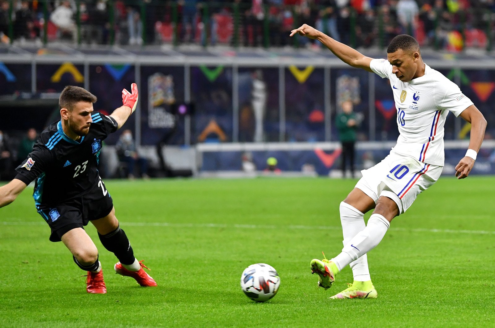 Kylian Mbappe of France scores their side&#039;s second goal past Unai Simon of Spain during the UEFA Nations League 2021 Final match between Spain and France at San Siro Stadium, Milan, Italy, Oct. 10, 2021. (Getty Images Photo)