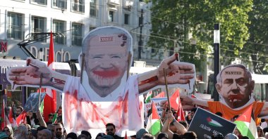 Demonstrators carry placards depicting U.S. President Joe Biden and Israeli Prime Minister Benjamin Netanyahu during a pro-Palestinian rally, Istanbul, Türkiye, June 1, 2024. (Reuters Photo)