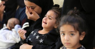 Mourners react next to the bodies of Palestinians killed in Israeli strikes in Rafah, southern Gaza Strip, Palestine, June 18, 2024. (Reuters Photo)