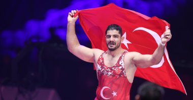 Türkiye's Taha Akgül celebrates after winning against Geno Petriashvili during Men's Freestyle 125 kg. weight Senior European Wrestling Championship gold medal match at Arena Zagreb, Zagreb, Croatia, April 19, 2023. (Getty Images Photo)