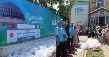 Diyanet staff distributes meat from 100 cattle to needy families, Astana, Kazakhstan, June 16, 2024. (AA Photo)