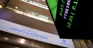 A trading screen is seen in the lobby of the London Stock Exchange, London, Britain, May 14, 2024. (Reuters Photo)