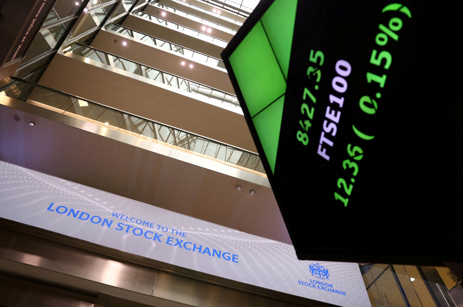 A trading screen is seen in the lobby of the London Stock Exchange, London, Britain, May 14, 2024. (Reuters Photo)