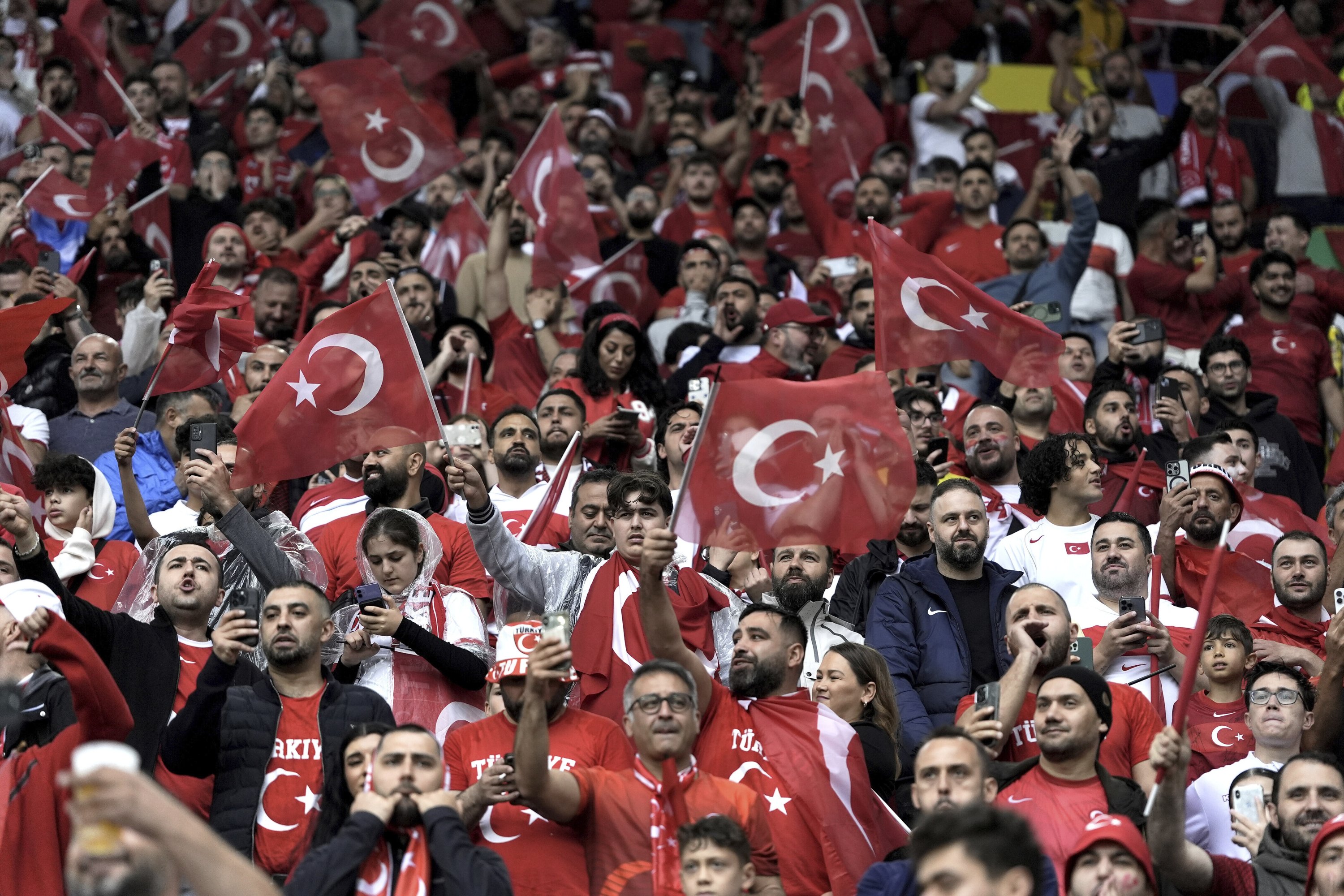 Turkish fans await the start of a Group F match between Türkiye and Georgia at the Euro 2024 tournament, Dortmund, Germany, June 18, 2024. (AP Photo)