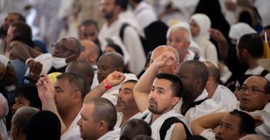 Muslim pilgrims participate in the symbolic stoning of the devil ritual at the Jamarat Bridge during the Hajj pilgrimage near Mecca, Saudi Arabia, June 16, 2024. (EPA Photo)