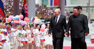 Russian President Vladimir Putin (L) and North Korean leader Kim Jong Un (R) attend an official welcoming ceremony in Pyongyang, North Korea, June 19, 2024. (EPA Photo)
