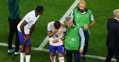 France's Kylian Mbappe walks off the pitch after breaking his nose during a match, Dusseldorf, Germany, June 17, 2024. (Reuters Photo)