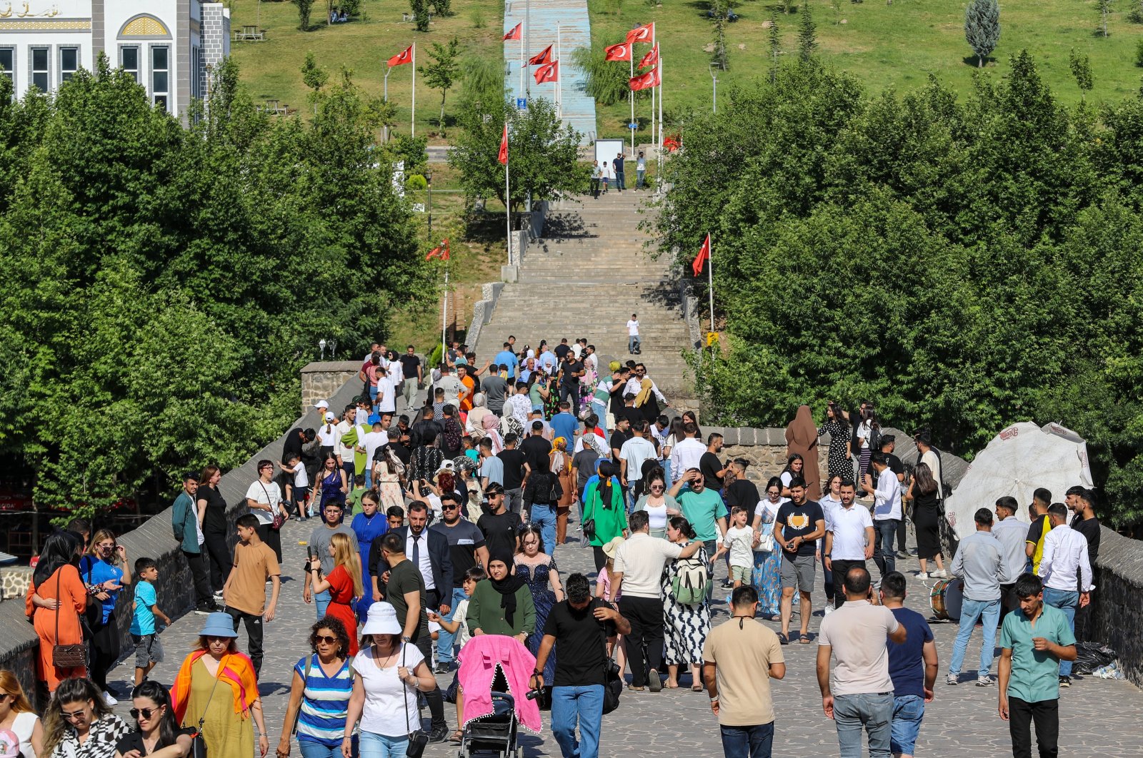 The crowds walk on the street during Qurban Bayram, Diyarbakir, Türkiye, June 18, 2024. (AA Photo)