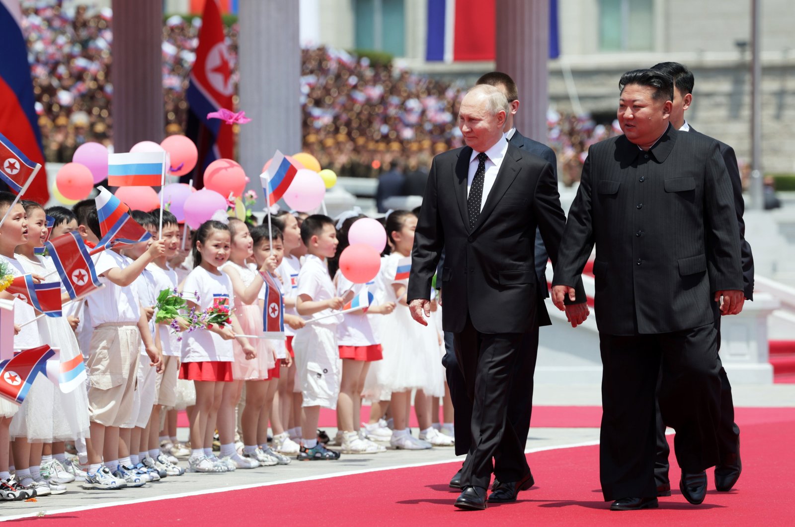 Russian President Vladimir Putin (L) and North Korean leader Kim Jong Un (R) attend an official welcoming ceremony in Pyongyang, North Korea, June 19, 2024. (EPA Photo)