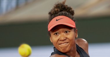 Japan's Naomi Osaka keeps her eye on the ball during her match against Iga Swiatek of Poland at Stade Roland Garros, Paris, France, May 29, 2024. (Reuters Photo)