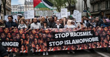 Demonstrators are holding a banner that reads "Stop Racism, Stop Islamophobia" during a protest against racism and Islamophobia in Paris, France, on April 21, 2024. (Reuters File Photo)