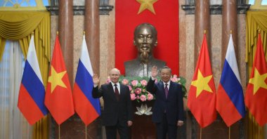 Russia's President Vladimir Putin and Vietnam's President To Lam pose for photos during an official visit at the Presidential Palace in Hanoi, Vietnam, June 20, 2024. (Reuters Photo)