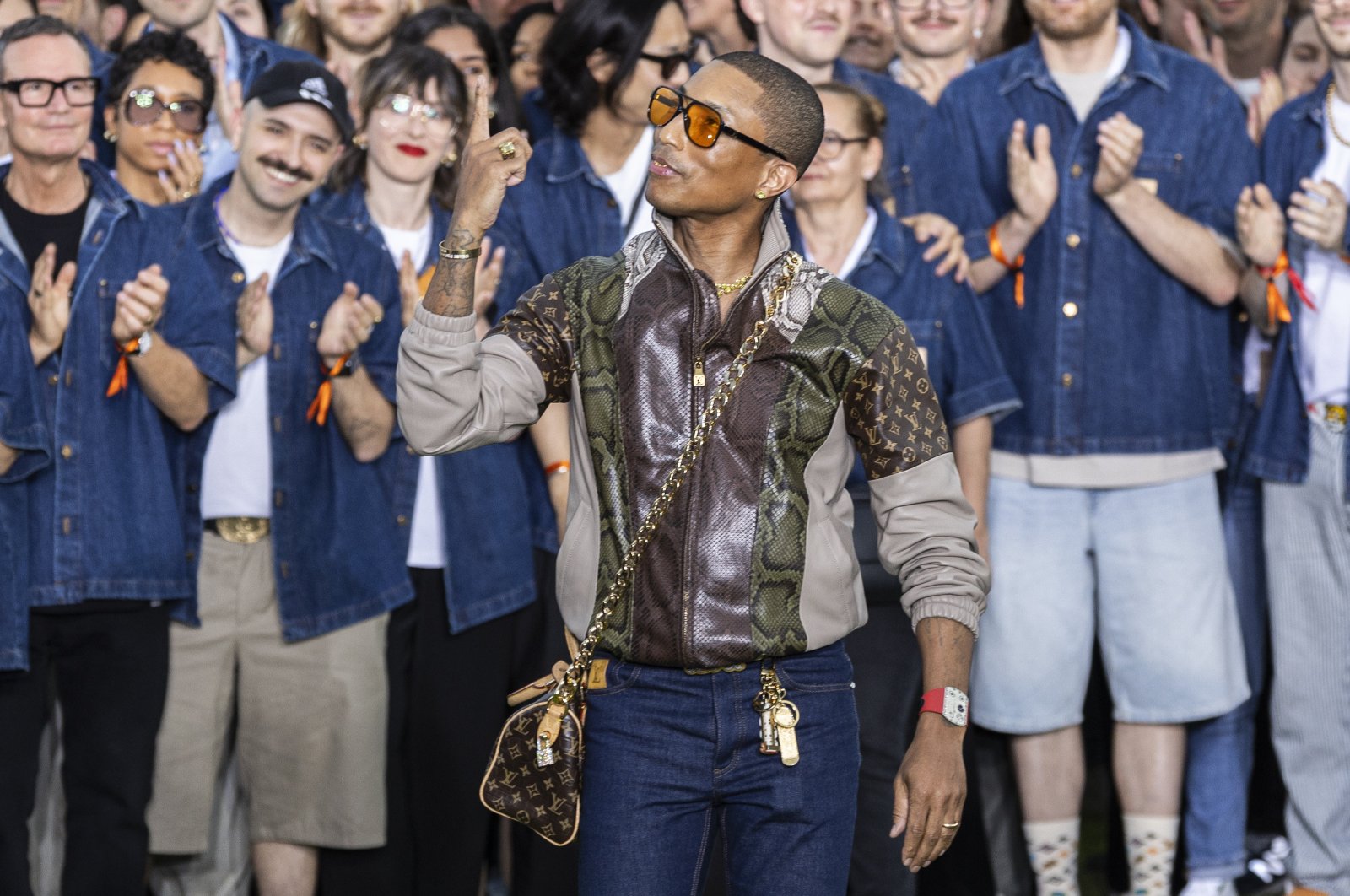 Pharrell Williams gestures after presenting his collection for Louis Vuitton fashion house during the Spring/Summer 2025 Menswear Collection at the Paris Men&#039;s Fashion Week, Paris, France, June 18, 2024. (EPA Photo)