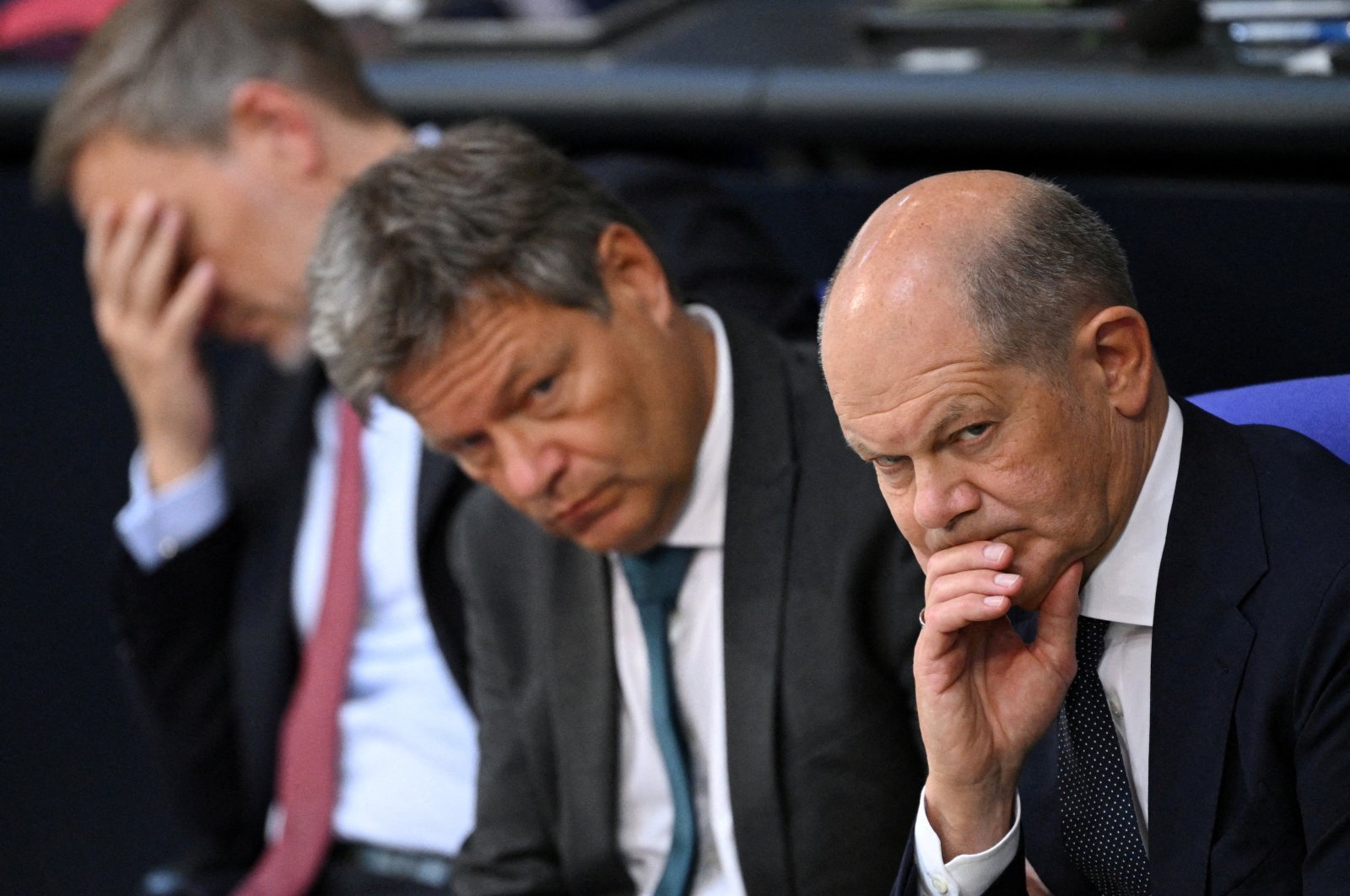 German Chancellor Olaf Scholz and Economy and Climate Minister Robert Habeck look on after a government statement about current security issues at the lower house of parliament, the Bundestag, Berlin, Germany, June 6, 2024. (Reuters Photo)