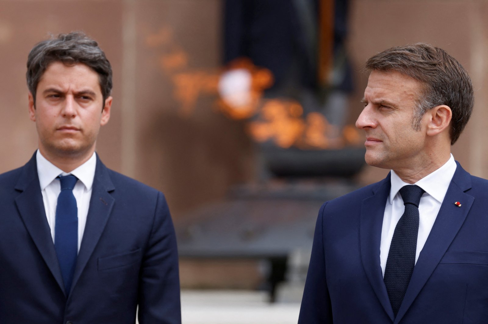 French President Emmanuel Macron and France&#039;s Prime Minister Gabriel Attal attend a ceremony marking the 84th anniversary of late French Gen. Charles de Gaulle&#039;s World War II resistance call of June 18, 1940, at the Mont-Valerien memorial, Suresnes, France, June 18, 2024. (Reuters Photo)