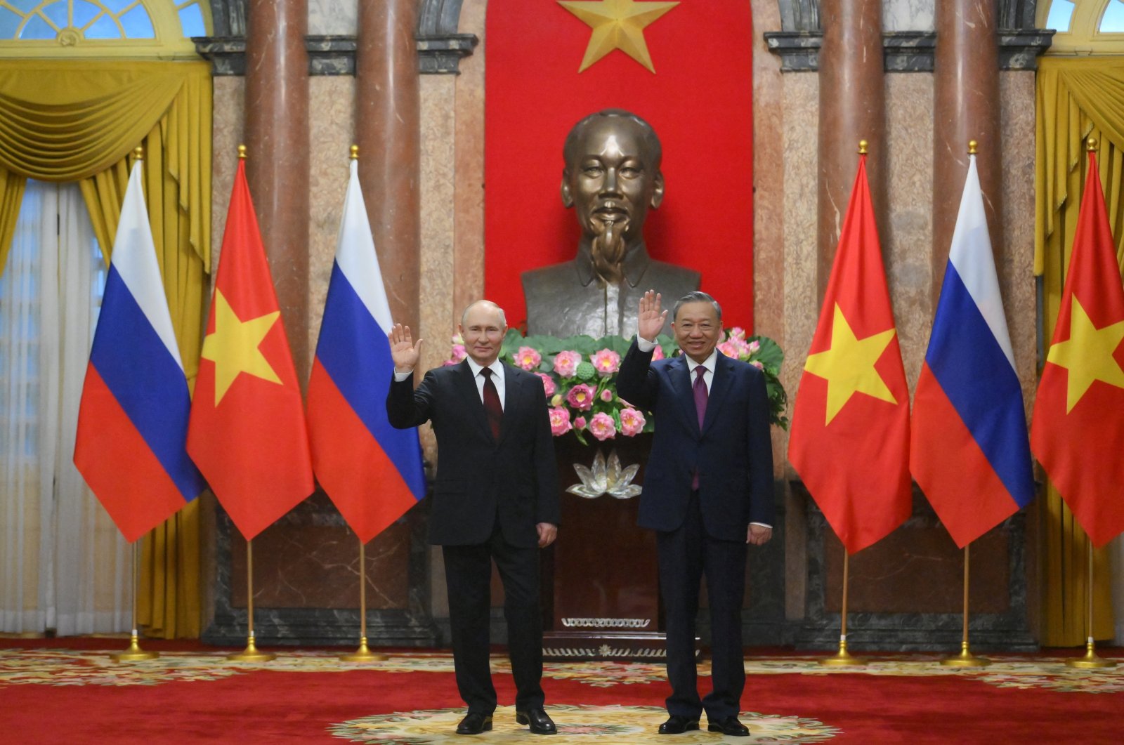 Russia&#039;s President Vladimir Putin and Vietnam&#039;s President To Lam pose for photos during an official visit at the Presidential Palace in Hanoi, Vietnam, June 20, 2024. (Reuters Photo)