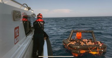 The Turkish coast guard picks up a life raft carrying 27 migrants pushed back by Greece off the coast of Marmaris district in the Muğla province, Türkiye, June 21, 2024. (IHA Photo)