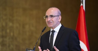 Treasury and Finance Minister Mehmet Şimşek speaks during the International Arab Banking Summit in Istanbul, Türkiye, May 23, 2024. (AA Photo)