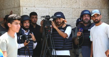 Palestinian journalists cover the arrival of injured and killed Palestinians brought to the al-Aqsa Martyrs Hospital, Deir al-Balah, Gaza Strip, Palestine, June 8, 2024. (AFP Photo)
