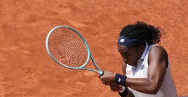 U.S. Coco Gauff plays a backhand return to Poland's Iga Swiatek during their women's singles semifinal match on Day 12 of the French Open at the Roland Garros, Paris, France, June 6, 2024. (AFP Photo)