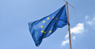 A European Union flag flies in the wind over the Lyon Tourist Office in Lyon, France, on June 10, 2024. (Reuters Photo)