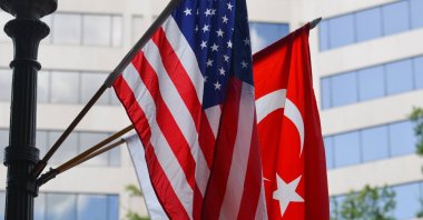 Turkish and American national flags on a flagpole at an unspecified location in this undated file photo. (Shutterstock File Photo)