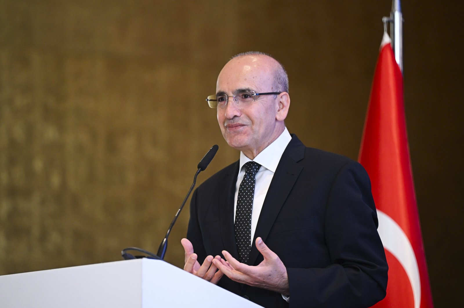 Treasury and Finance Minister Mehmet Şimşek speaks during the International Arab Banking Summit in Istanbul, Türkiye, May 23, 2024. (AA Photo)
