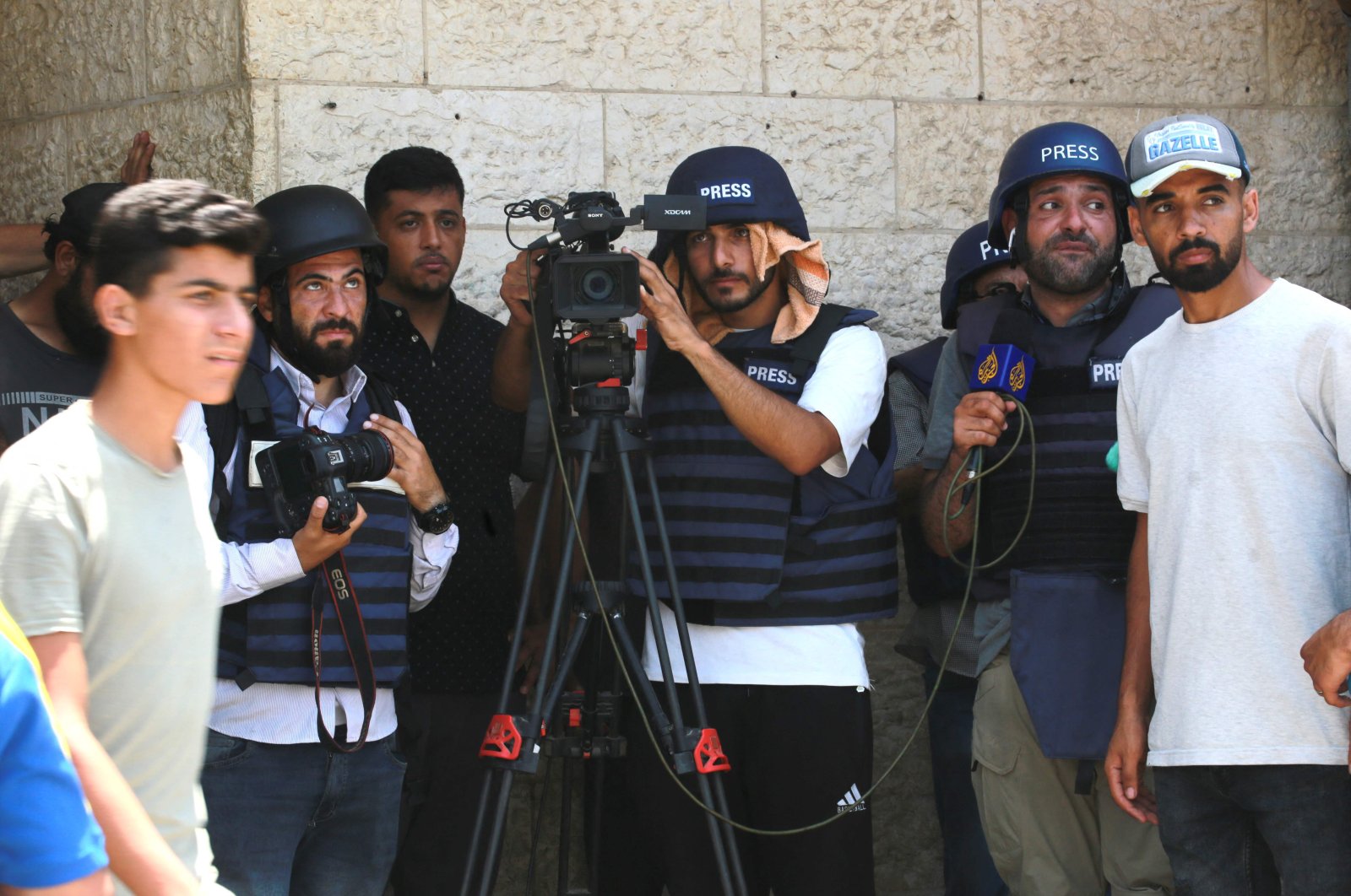 Palestinian journalists cover the arrival of injured and killed Palestinians brought to the al-Aqsa Martyrs Hospital, Deir al-Balah, Gaza Strip, Palestine, June 8, 2024. (AFP Photo)