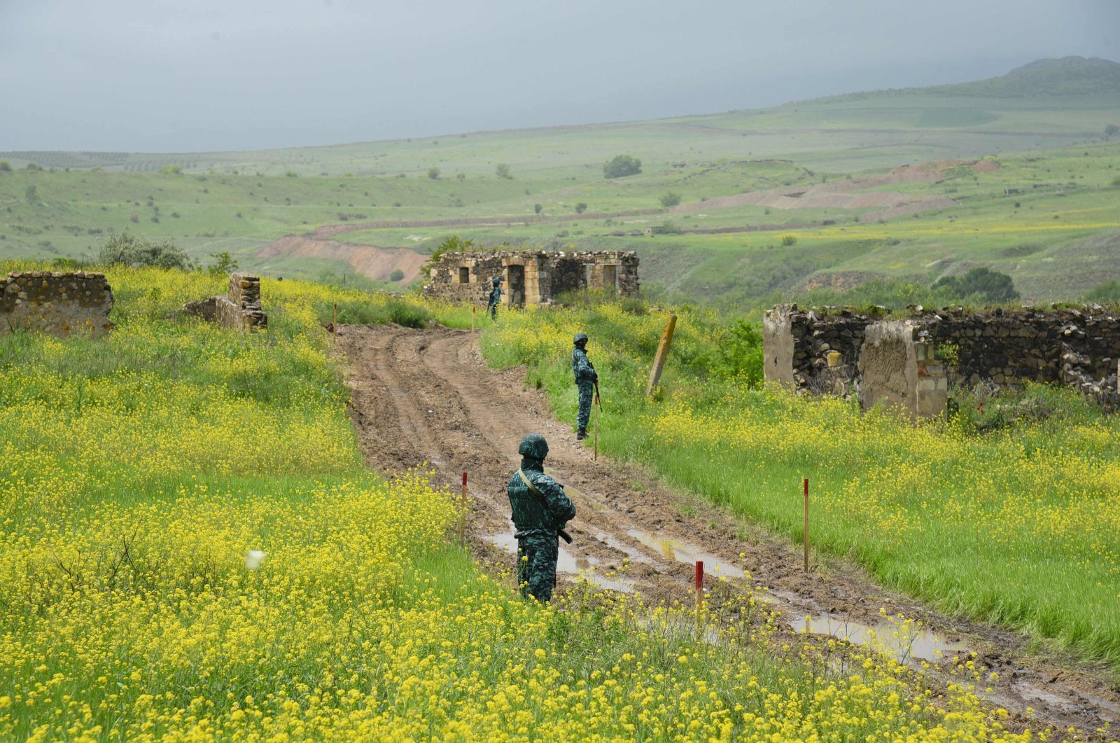 Azerbaijani border guards are seen in Ghizilhajili, one of the four villages Armenia recently returned to Azerbaijani control under a border demarcation deal between the Caucasus rivals, the Karabakh region, Azerbaijan, May 28, 2024. (AFP Photo)